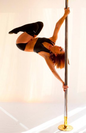 Photograph of a dancer on a pole